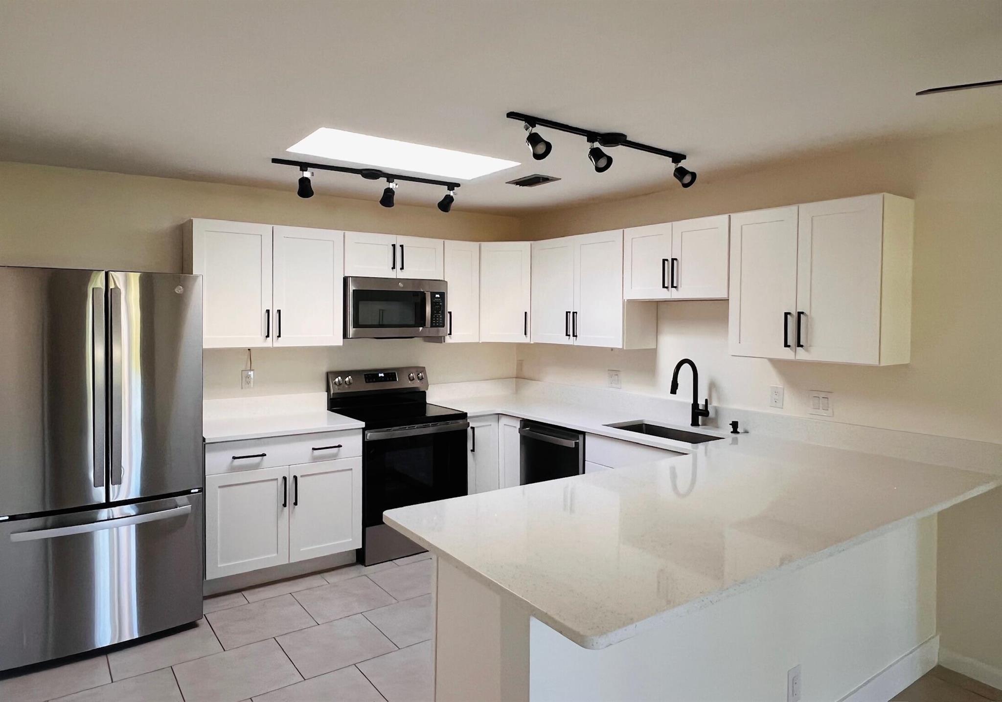 Your beautiful 2-bedroom,1 bathroom apartment features a new kitchen and bath. This pet-friendly 4-plex, back corner unit has an outdoor patio, generous yard and fire pit. All new GE stainless steel appliances, Electrolux washer & dryer, quartz countertops, with white shaker cabinets, in kitchen and bath. Bring your furry friends as we are pet friendly. Available now annually...