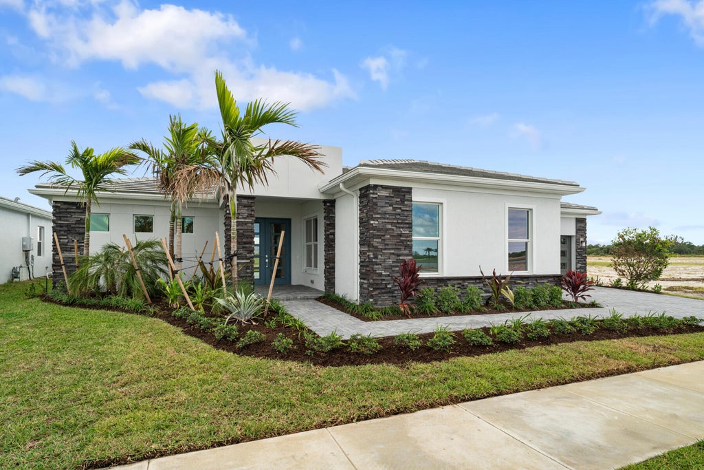 Photo of 10639 SW Vineyard Drive, Port Saint Lucie, FL 34987 (MLS # R10915572)