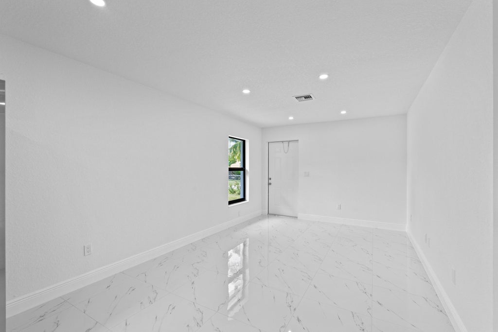 Photo of 616 S Pine Street #B, Lake Worth, FL 33460 (MLS # B26079631)