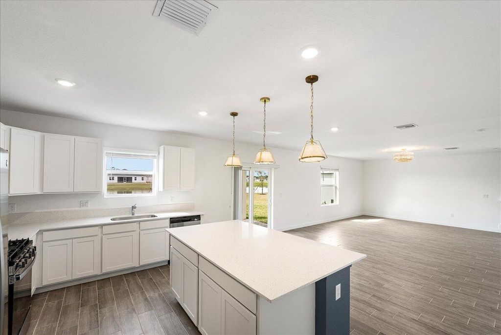 Photo of 6338 NW Windwood Way, Port Saint Lucie, FL 34987 (MLS # R11075060)