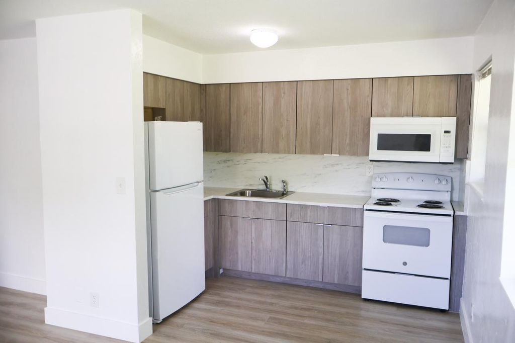 Photo of 1548 NW 52nd Avenue #1, Lauderhill, FL 33313 (MLS # F10519975)