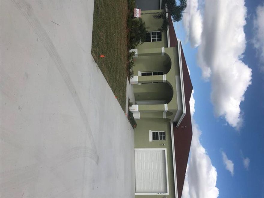 Brand New 4/2/1 Home By Villafranca Design & Development.  CBS Construction  PGT Windguard Impact Resistant Windows. Covered Patio