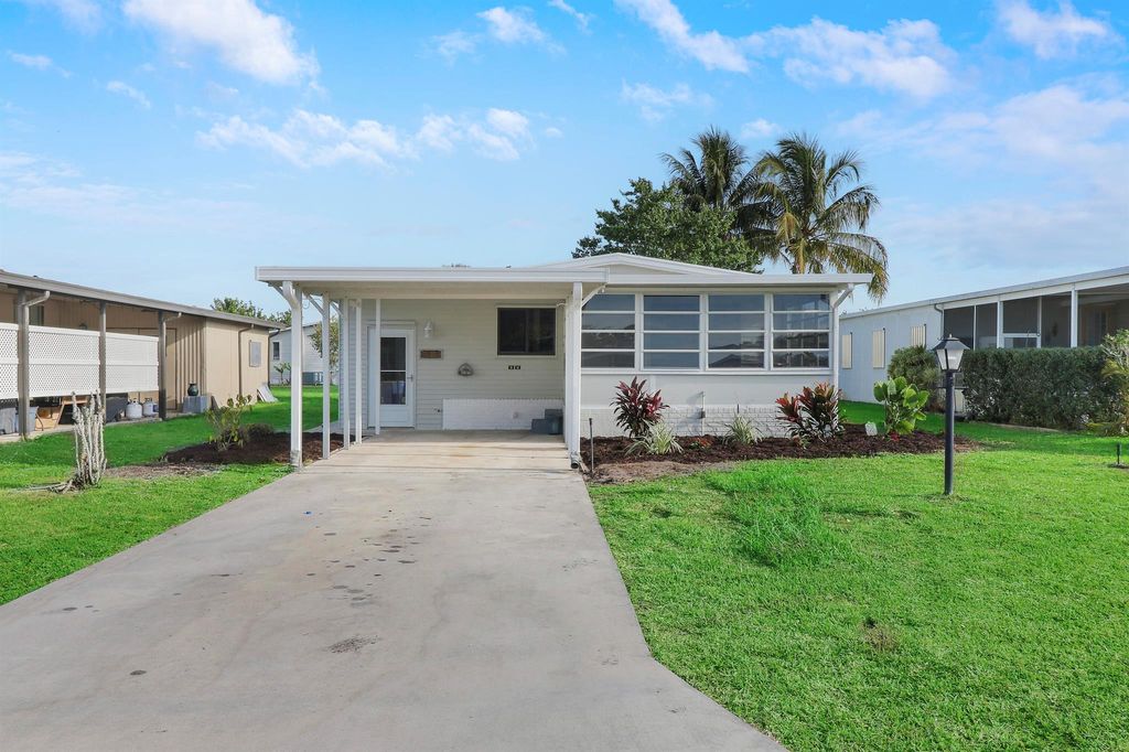 Photo of 2719 SW Thunderbird Trail, Stuart, FL 34997 (MLS # R10973205)