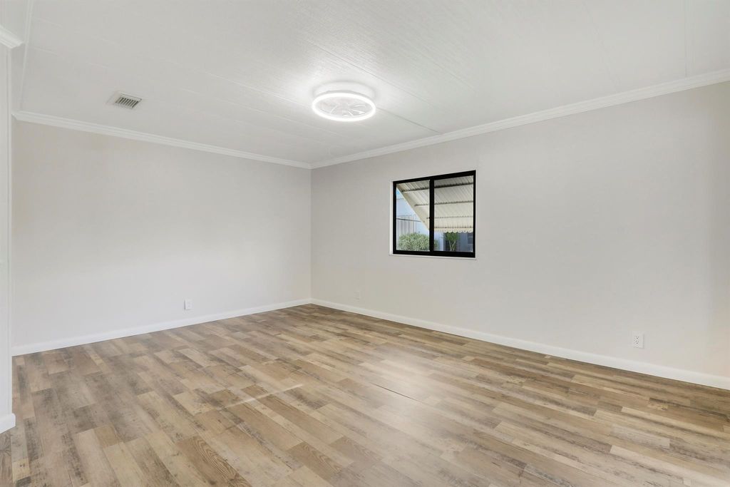 Photo of 2719 SW Thunderbird Trail, Stuart, FL 34997 (MLS # R10973205)