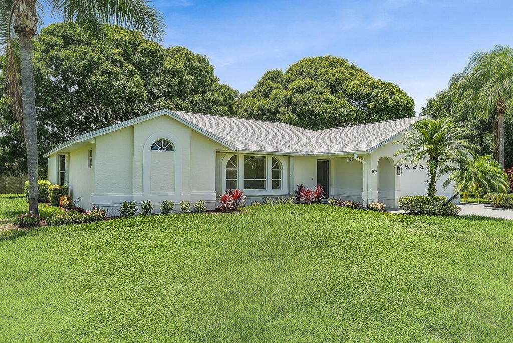 Photo of 1812 NE Crabtree Lane, Jensen Beach, FL 34957 (MLS # R11099370)