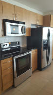 Magnificent City , water and pool views from this spacious, modern , corner unit. Located adjacent to City Place, near beaches, shops and restaurants .Building has all the modern amenities, spectacular pool, spa, cabana, meditation room, fitness center, walking and jogging path, as well as media and business center in clubhouse.Bright, open floor plan with high ceilings, stainless appliances, granite counters, and split bedroom plan.