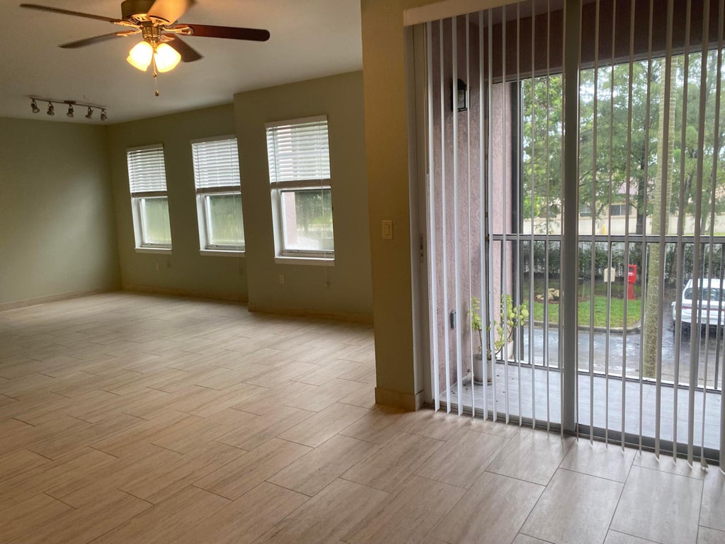 Photo of 6920 W SAMPLE Road W #6920, Coral Springs, FL 33067 (MLS # B26083082)