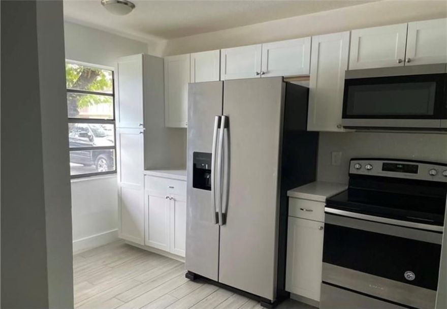 CASH ONLY. RARE FIND GREAT INVESTMENT.  "1% rule" Spacious 2Bed/1Bath unit. Become a landlord instantly. Current tenant paying $1,650.00 per month, lease expire end of August. Afterwards, continue having an investment property, or make it your own; Living in a beautifully remodeled home in 2019 featuring new tile floors, new stainless steel appliances, new quartz countertop, new kitchen cabinets, completely redone bathroom & more! AC and Water heater all 2019. Community includes pool, recreation Facilities, and common area. Centrally located near major highways/roadways such as Turnpike, 441, and Commercial Blvd. Lots of shopping centers and restaurants nearby! Hurry and don't miss this opportunity.