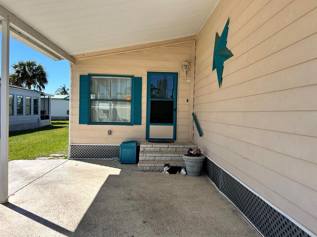 Photo of 70 Lagos Del Norte, Fort Pierce, FL 34951 (MLS # R11071922)