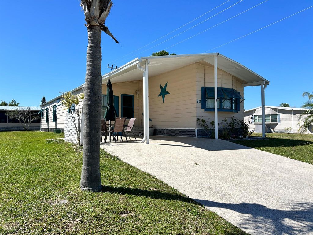 Photo of 70 Lagos Del Norte, Fort Pierce, FL 34951 (MLS # R11071922)