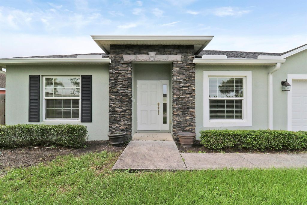 Photo of 3640 SW Hale Street, Port Saint Lucie, FL 34953 (MLS # R11015232)