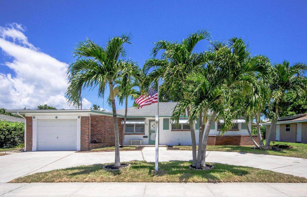 Photo of 329 Bayberry Drive, Lake Park, FL 33403 (MLS # R10909529)