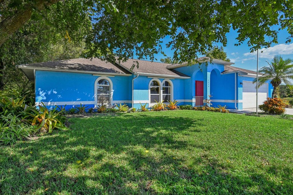 Photo of 2099 SW Janette Avenue, Port Saint Lucie, FL 34953 (MLS # R11132968)