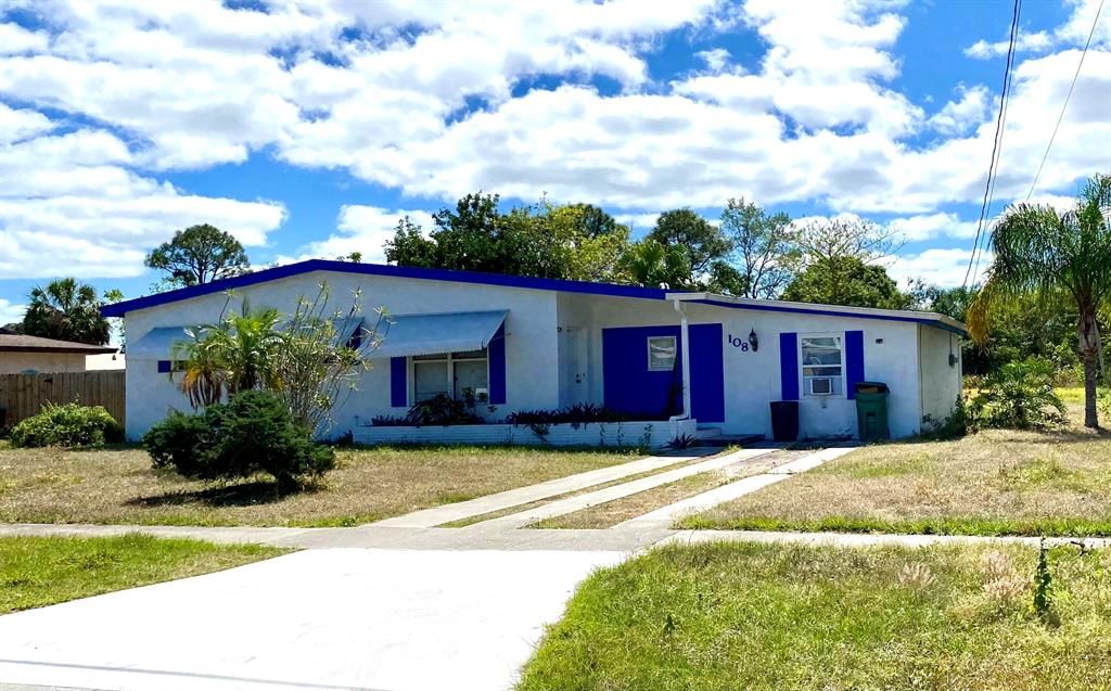 Photo of 108 SE Naranja Avenue, Port Saint Lucie, FL 34983 (MLS # R10875128)