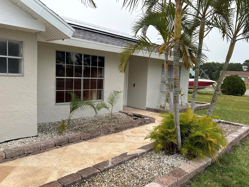 Photo of 325 SW Bridgeport Drive, Port Saint Lucie, FL 34953 (MLS # R10966242)