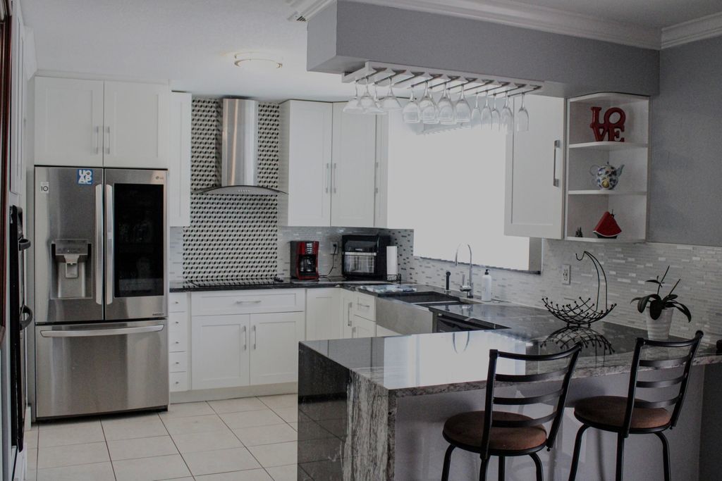 Photo of 325 SW Bridgeport Drive, Port Saint Lucie, FL 34953 (MLS # R10966242)