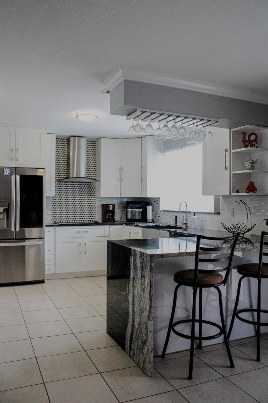 Photo of 325 SW Bridgeport Drive, Port Saint Lucie, FL 34953 (MLS # R10966242)