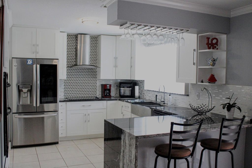 Photo of 325 SW Bridgeport Drive, Port Saint Lucie, FL 34953 (MLS # R10966242)