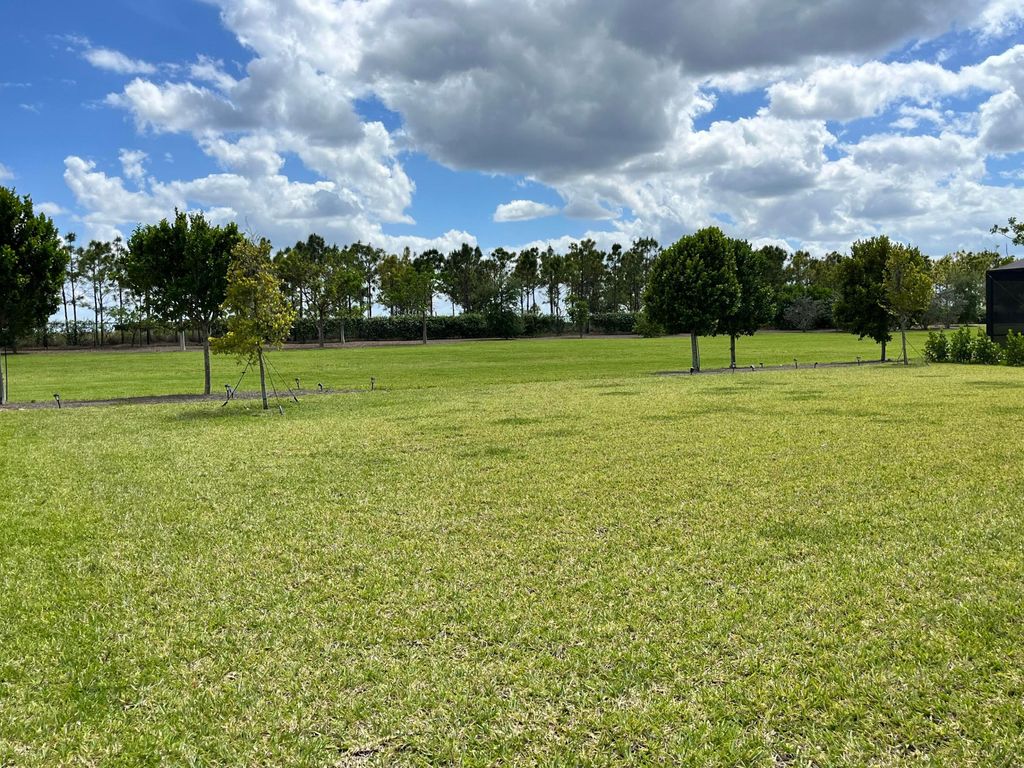 Photo of 686 Hookline Circle, The Acreage, FL 33470 (MLS # B26033330)