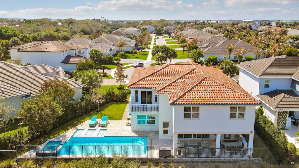 Photo of 2475 NE Evinrude Circle, Jensen Beach, FL 34957 (MLS # R11169860)