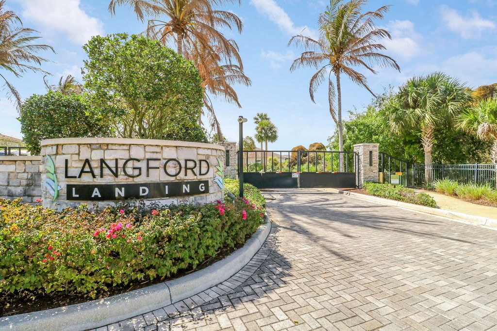 Photo of 2475 NE Evinrude Circle, Jensen Beach, FL 34957 (MLS # R11169860)