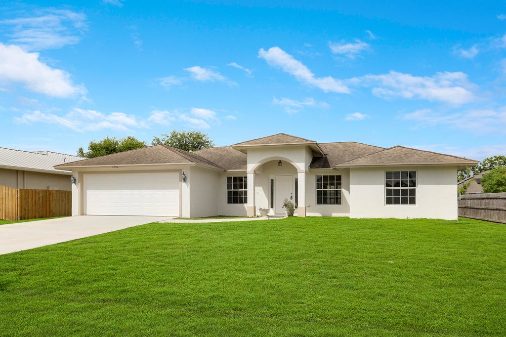 Photo of 1942 SW Hampshire Lane, Port Saint Lucie, FL 34953 (MLS # R11017439)