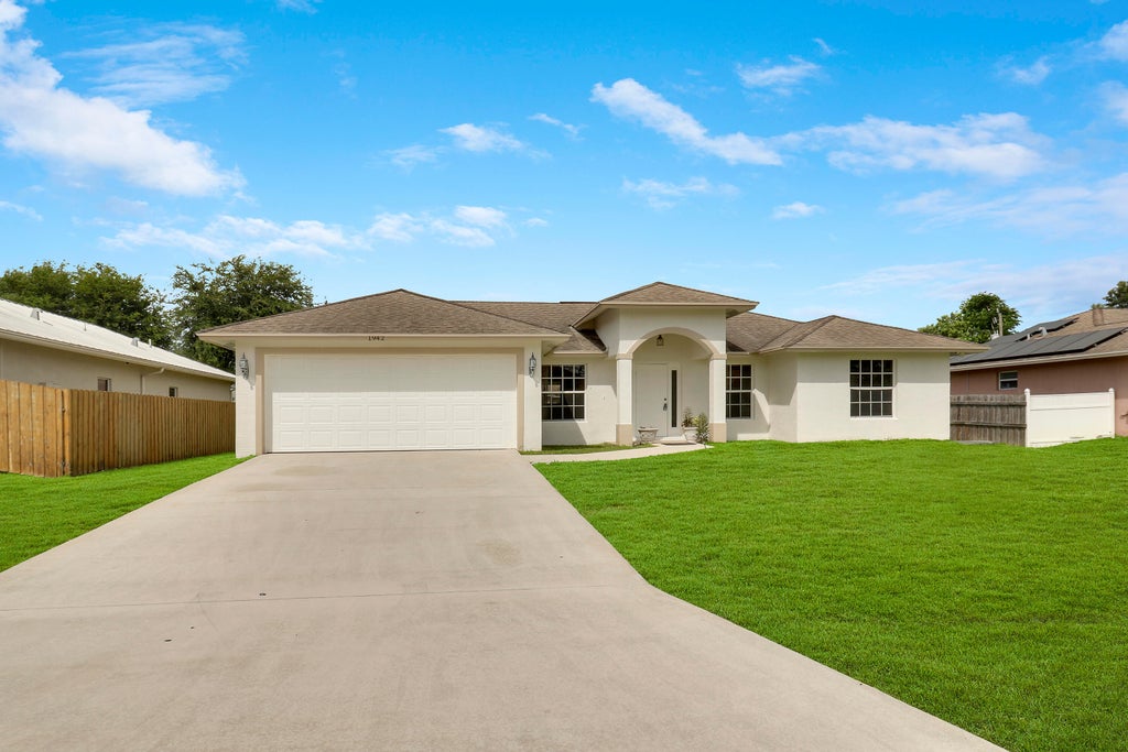 Photo of 1942 SW Hampshire Lane, Port Saint Lucie, FL 34953 (MLS # R11017439)
