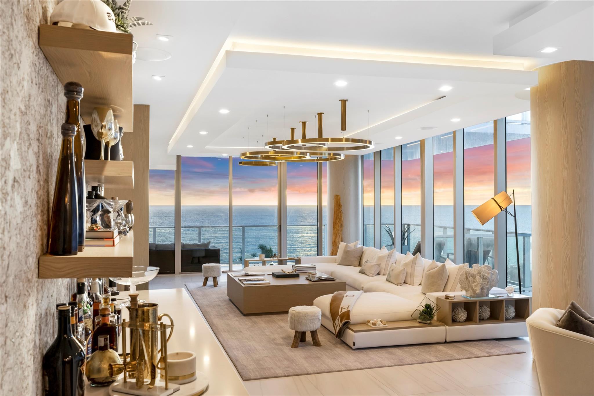 Experience stunning sunrises over the Atlantic Ocean and gorgeous sunset views of the Intracoastal and city skyline in this modern 4 Beds and 5 Baths corner residence, complete with a family room and office. This modern floor plan features spacious East and West balconies and offers 3,500 sq. ft. of luxurious living space. Indulge in the meticulously designed interiors with high-end finishes throughout. The chef’s kitchen showcases a large Sub-Zero wine storage and refrigerator, a Wolf gas stove, and an integrated espresso system. Enjoy the convenience of extra storage in every room and a spacious laundry area. Live in 5-star luxury with world-class amenities, including a fitness center, golf simulator, Napa Valley wine room, cigar lounge, day cabanas, and more!