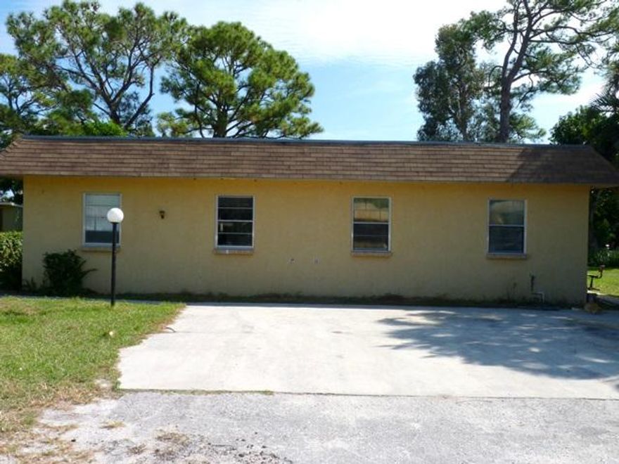 Money maker duplex located on a dead end street on .25 acre lot. Large 4 car driveway. 2 bedroom/1 bathroom each side with private entry and you can also add fence for 2 private backyard's. Each unit has washer dryer hook up and screened back patios. Both units have updated kitchens. Just requires minor cosmetics for new occupancy. Great location within walking distance to shopping and employment. Easy showings with advanced notice.