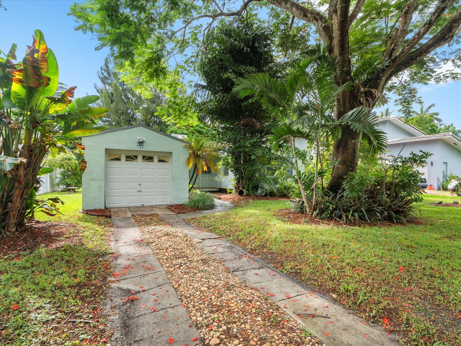 Welcome to 125 South Drive -- a true generational gem ready for its next chapter. Nestled on one of the most desirable streets in Miami Springs, this charming 2-bedroom, 1-bath home offers over 1,000 sq ft of interior space on a generous 7,800 sq ft lot. Just a short walk to the Circle, parks, and local favorites, the location is unbeatable.This property is perfect for buyers looking to renovate and customize a home to their taste. Whether you're an end-user or investor, the potential is endless in one of Miami's most historic and tight-knit communities.Don't miss your chance to own a piece of Miami Springs and reimagine it into your forever home.