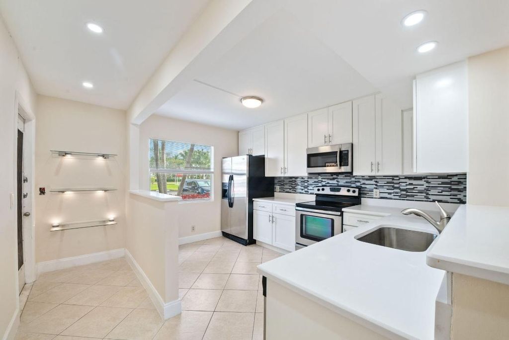 Photo of 1090 Guildford E #1090, Boca Raton, FL 33434 (MLS # R11148621)