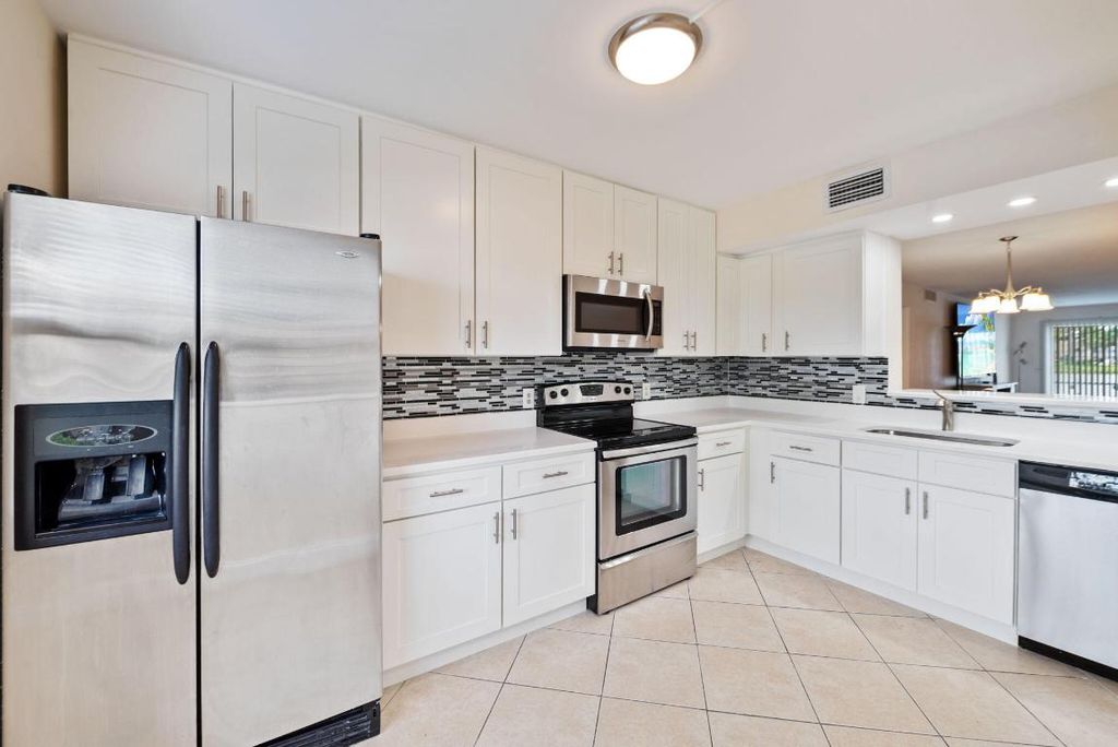 Photo of 1090 Guildford E #1090, Boca Raton, FL 33434 (MLS # R11148621)
