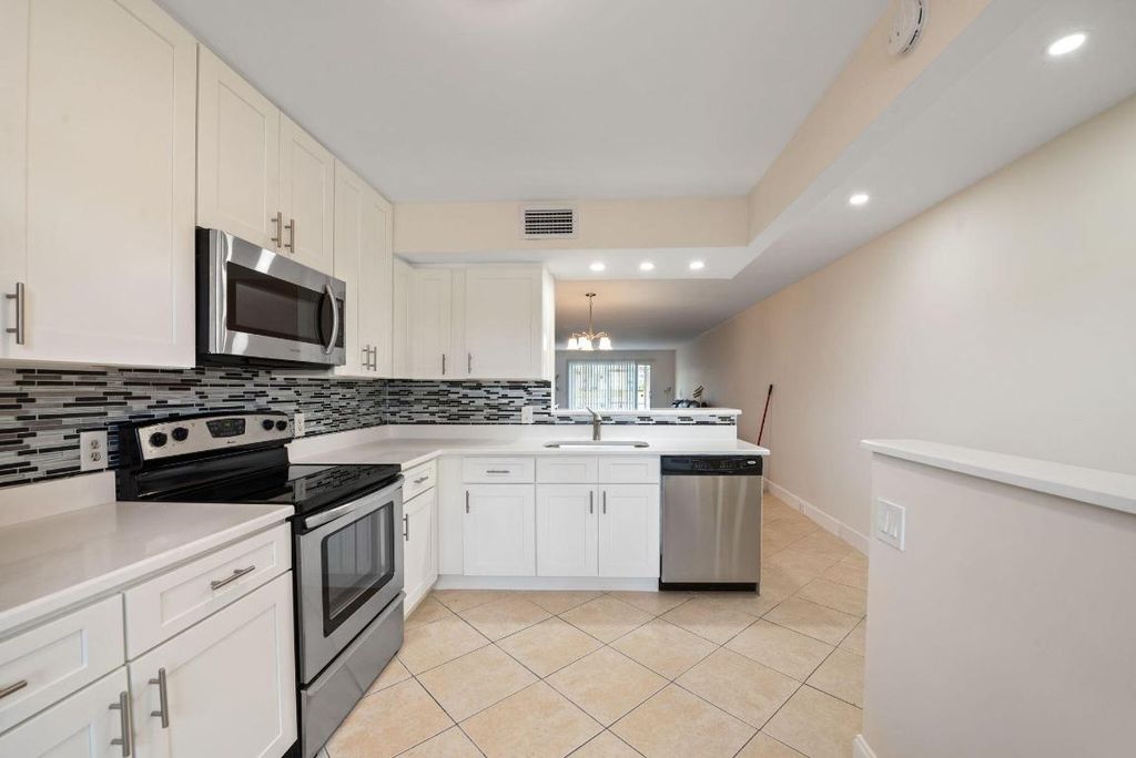 Photo of 1090 Guildford E #1090, Boca Raton, FL 33434 (MLS # R11148621)