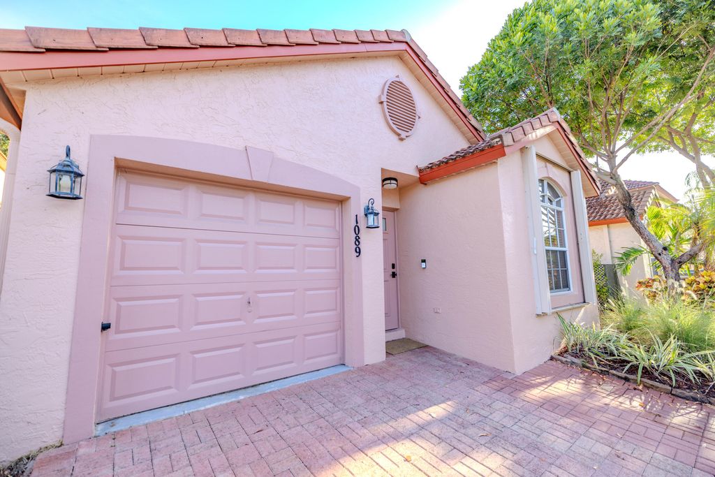 Photo of 1089 Via Jardin, West Palm Beach, FL 33418 (MLS # R11113084)