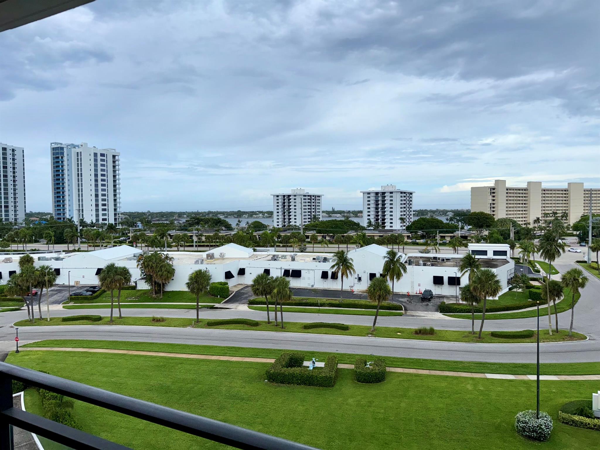 Rise and shine with divine views! Enjoy both sunrise and sunset from your double balcony in this comfortable 2-bedroom, 2-bath split floor plan. Located in the heart of North Palm Beach, you're just 10 minutes from the beach and 20 minutes to PBI Airport. The Gemini building offers a waterfront pool--perfect for cooling off in the summer heat--and includes a covered parking space for your convenience. Make this coastal retreat your next home!