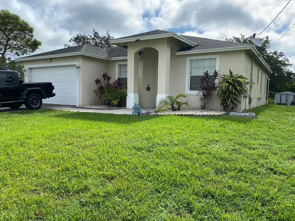 Photo of 3221 SW Mcmullen Street St, Port Saint Lucie, FL 34953 (MLS # R10808227)