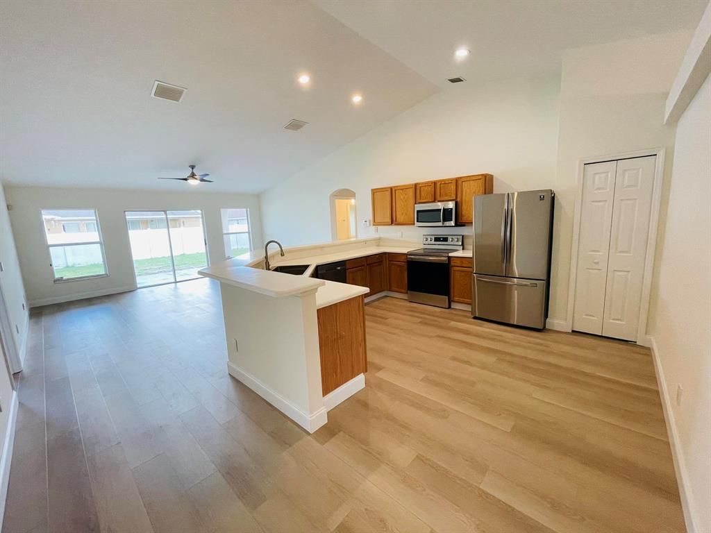 Photo of 961 SW Mccomkle Avenue Ave, Port St Lucie, FL 34953 (MLS # R10693942)