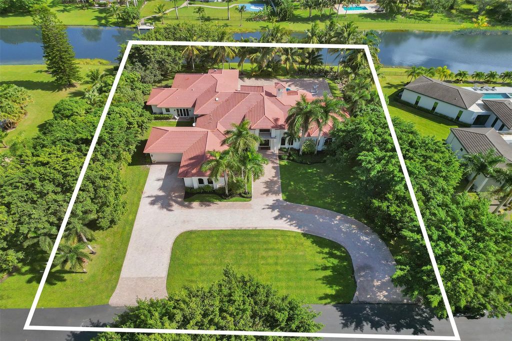 Photo of 16140 Rio Rodeo, Delray Beach, FL 33446 (MLS # B26025885)