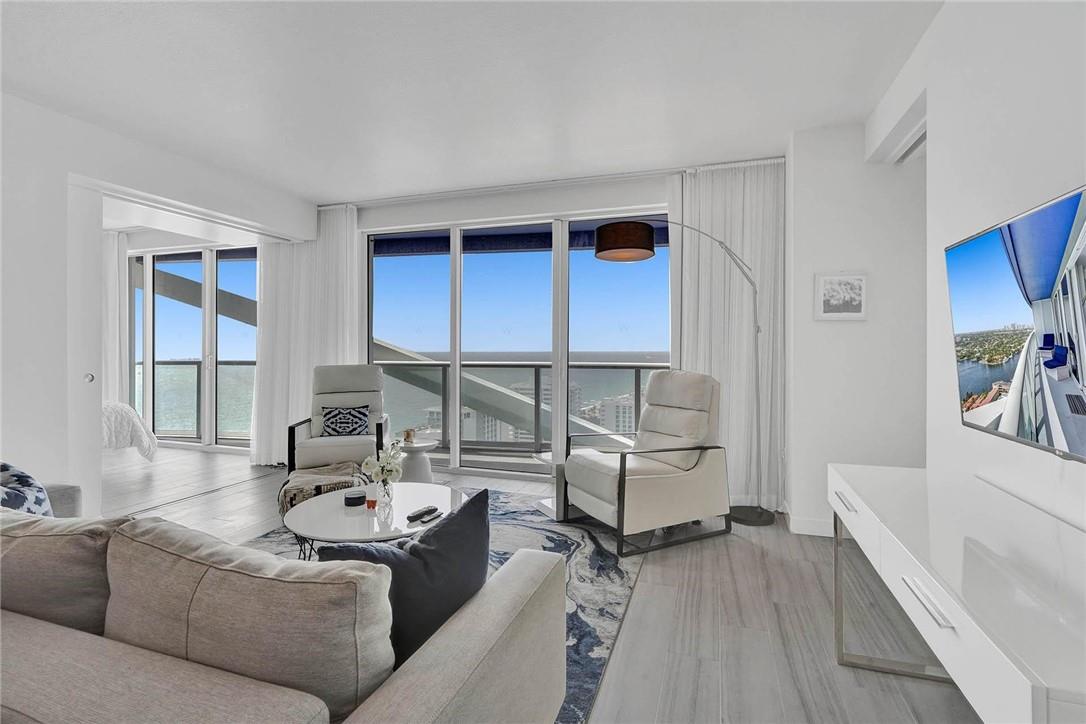 PENTHOUSE DIRECT OCEAN VIEWS like none other! Availability peak season starting December1. Luxurious top floor in full luxury resort setting in the heart of central beach. Modern spacious bright 2 BR 2BA penthouse includes: open living /dining areas and 2 master king size suites & spa like baths; Breakfast island and floor to ceiling windows; full expansive private balcony ideal for entertaining all in the famous "W" Resort Fort Lauderdale! Washer/dryer & home safe, stainless appliances & stone countertops! Garage parking, concierge/ 24 hour security, Heated heated pool and mere steps to ocean's edge! Newly furnished! Complete resort tropical beachside setting includes gym and parking. Walk to stores. All utilities/upgraded intent included. $11,500 per mo peak season & annual at less.