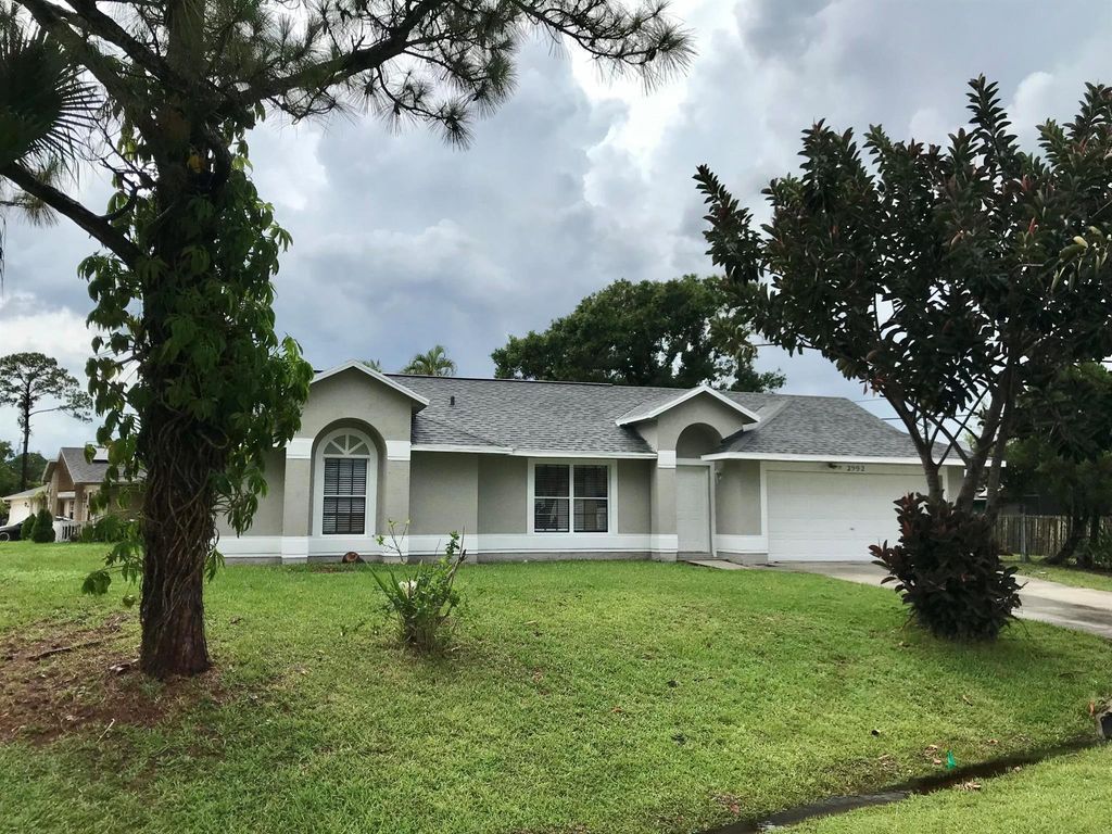 Photo of 2992 SW Lucerne Street, Port Saint Lucie, FL 34953 (MLS # R11011995)