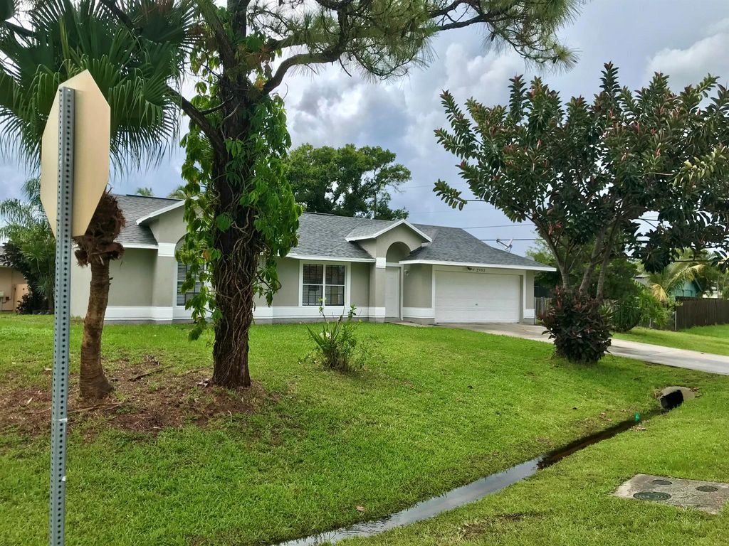 Photo of 2992 SW Lucerne Street, Port Saint Lucie, FL 34953 (MLS # R11011995)