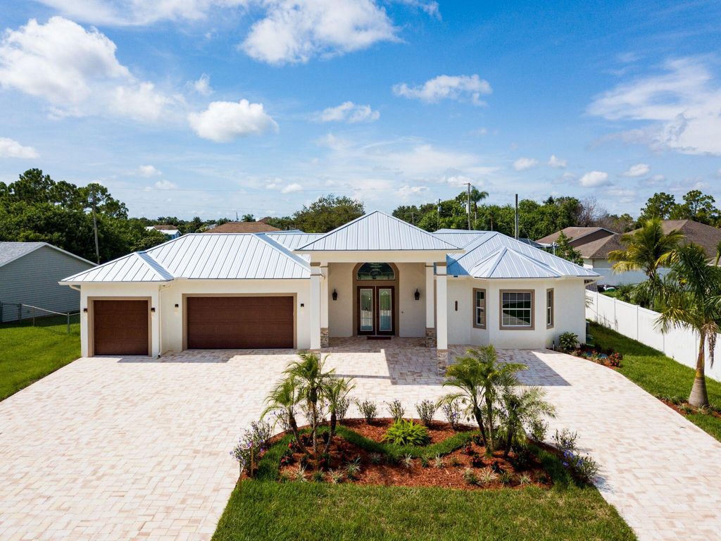 Photo of 2682 SW Import Drive, Port Saint Lucie, FL 34987 (MLS # R11108568)