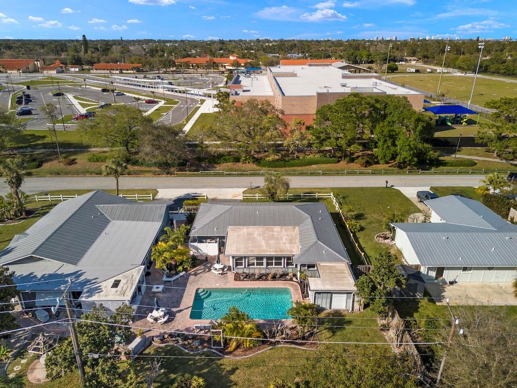 Photo of 1374 NE 24th Street, Jensen Beach, FL 34957 (MLS # R10965246)