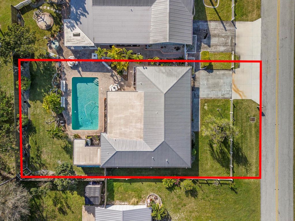 Photo of 1374 NE 24th Street, Jensen Beach, FL 34957 (MLS # R10965246)