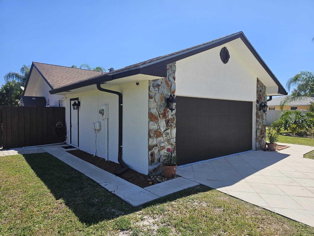 Photo of 109 Gibraltar Street, Royal Palm Beach, FL 33411 (MLS # B26022200)