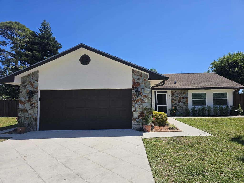 Photo of 109 Gibraltar Street, Royal Palm Beach, FL 33411 (MLS # B26022200)