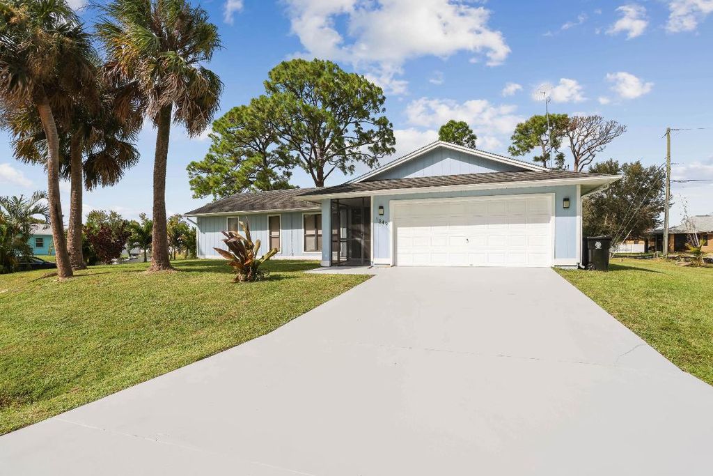 Photo of 1349 SW Patricia Avenue, Port Saint Lucie, FL 34953 (MLS # R10927616)