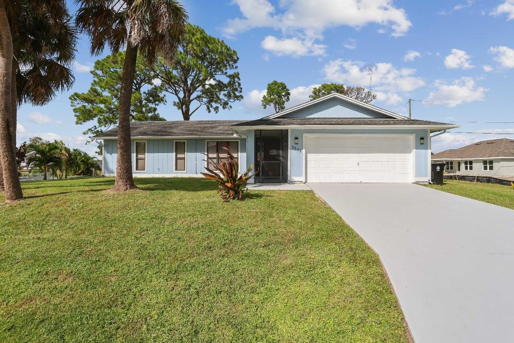 Photo of 1349 SW Patricia Avenue, Port Saint Lucie, FL 34953 (MLS # R10927616)