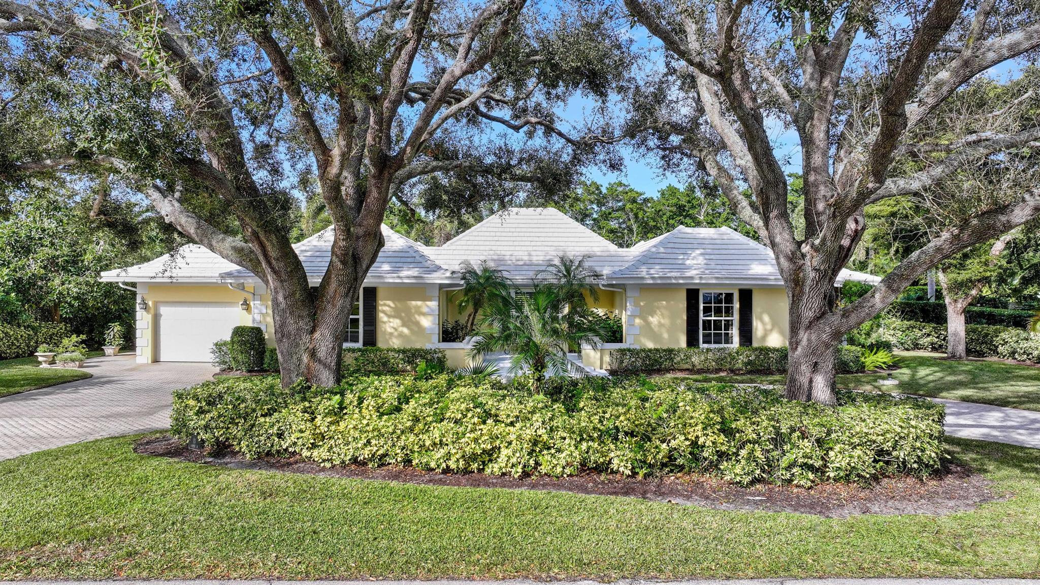 Graced with stately oaks and situated on .47 of an acre, this is a one of a kind offer in the private enclave of the Village of Golf. This delightful 3-bedroom, 3-bathroom home exudes warmth and character, perfect for those seeking a tranquil yet convenient lifestyle. Step inside to discover a thoughtfully designed layout that flows seamlessly, featuring spacious open living spaces and abundant natural light. Designed by renowned architect Henry Harding, this home boasts classic tray ceilings in the living room and a family room that opens to a lovely patio, pool and spa. Nestled on a beautifully landscaped lot, the property offers a serene outdoor space ideal for relaxing or entertaining. Whether enjoying a morning coffee on the patio or hosting friends and family, you will fall in love