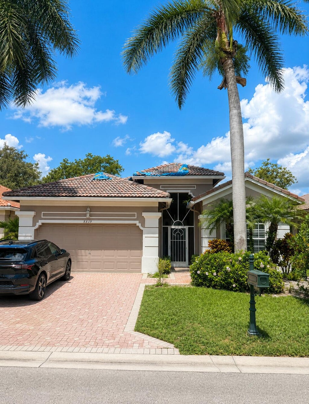 Photo of 8819 DOWNING Street, Boynton Beach, FL 33472 (MLS # B26059934)